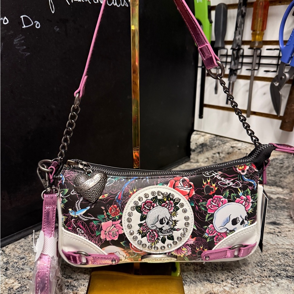 Ed Hardy Pink Floral Skull Accent Baguette Bag with crossbody